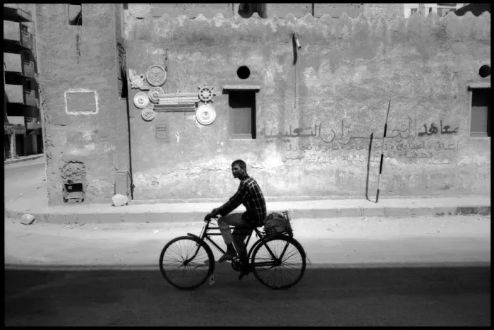 Framed Print : Young man on bike Cairo street, Egypt Framed Print : Young man on bike Cairo street, Egypt