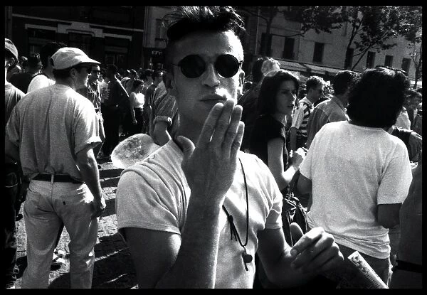Young man blowing a kiss at a demonstration, Paris, France