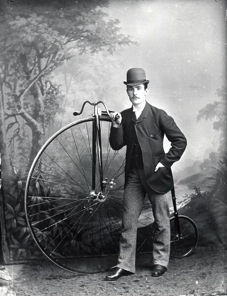 Young man and pennyfarthing, Haverfordwest, South Wales