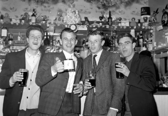 Framed Print : Four young men enjoying a pint of beer, Walton, Essex Framed Print : Four young men enjoying a pint of beer, Walton, Essex