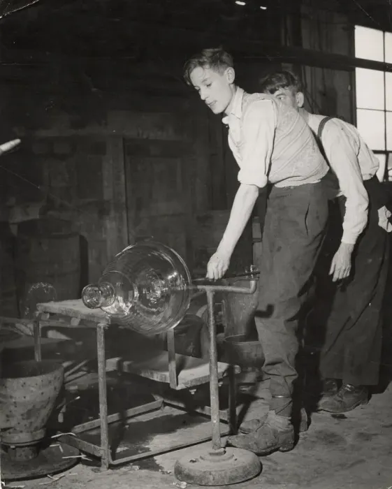 Framed Print : Young men spinning molten glass into a large cut glass bowl at Walsh Ltd Framed Print : Young men spinning molten glass into a large cut glass bowl at Walsh Ltd