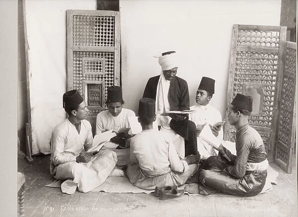 Young muslim boys being taught by a teacher, Egypt