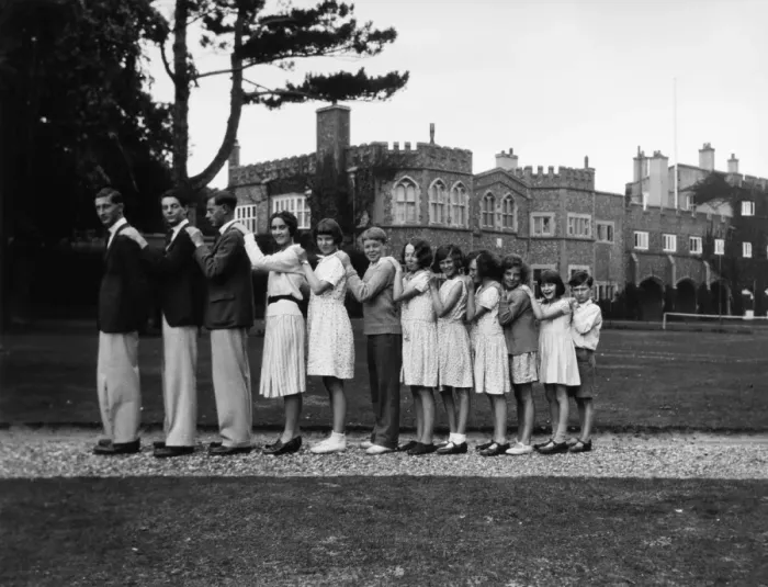 Framed Print : Twelve young people standing in a line Framed Print : Twelve young people standing in a line
