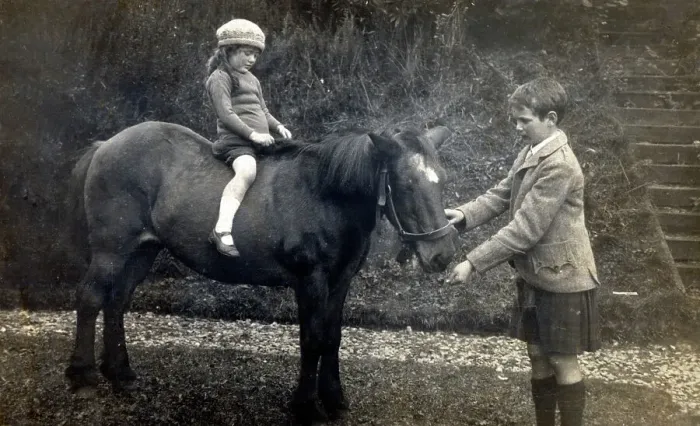 Framed Print : A young Scottish girl taken out for a ride on a pony Framed Print : A young Scottish girl taken out for a ride on a pony