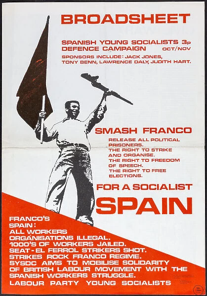 Young Spanish socialist with gun and flag