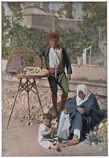 A young Turkish man selling sweets and cakes on the streets of Istanbul Date: 1890s
