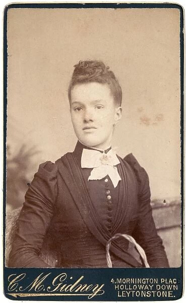 Young Victorian woman in a dark dress