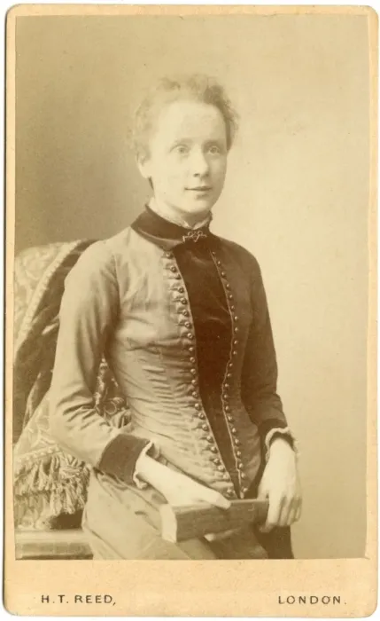 Framed Print : Young Victorian woman holding a folded fan Framed Print : Young Victorian woman holding a folded fan