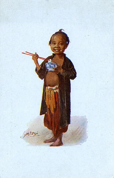 Young Vietnamese boy with his bowl of rice
