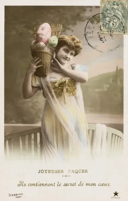 Framed Print : Young woman with a basket full of Easter eggs Framed Print : Young woman with a basket full of Easter eggs
