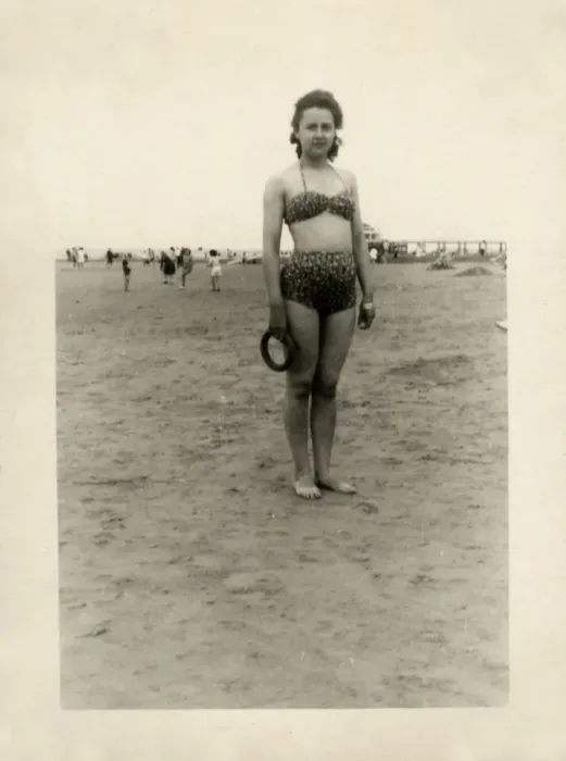 Framed Print : Young woman on the beach in leopardprint two-piece swimsuit Framed Print : Young woman on the beach in leopardprint two-piece swimsuit