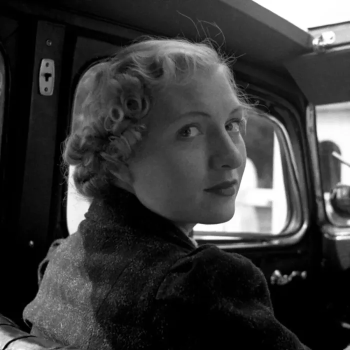 Framed Print : Young woman in car with open roof Framed Print : Young woman in car with open roof