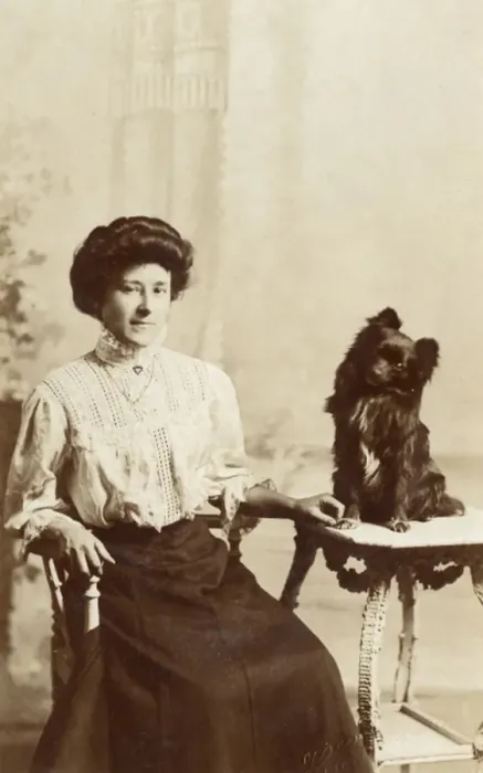 Framed Print : Young woman with dog in studio photo Framed Print : Young woman with dog in studio photo