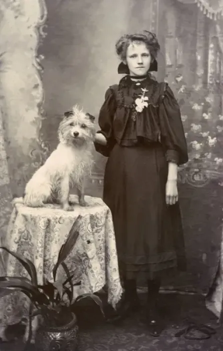 Framed Print : Young woman with dog in studio photo Framed Print : Young woman with dog in studio photo