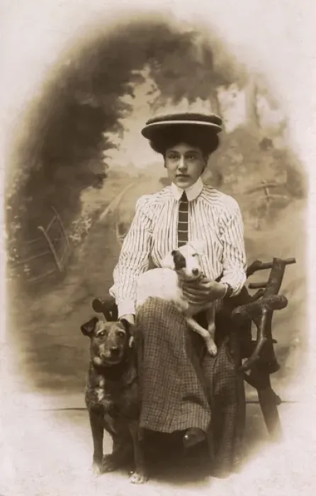 Framed Print : Young woman with two dogs in studio photo Framed Print : Young woman with two dogs in studio photo