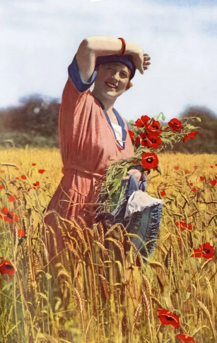 Framed Print : Young woman in a field of poppies, England Framed Print : Young woman in a field of poppies, England