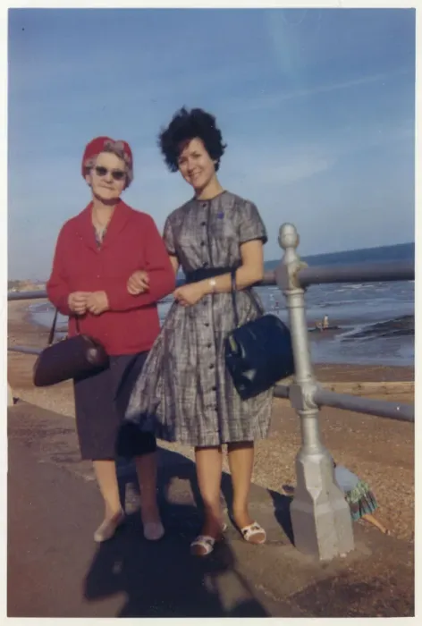 Framed Print : Young woman and her Grandmother take a stroll along seafront Framed Print : Young woman and her Grandmother take a stroll along seafront
