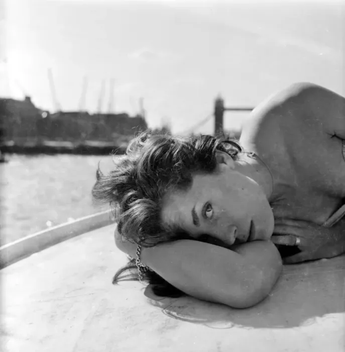 Framed Print : Young woman modelling on a boat