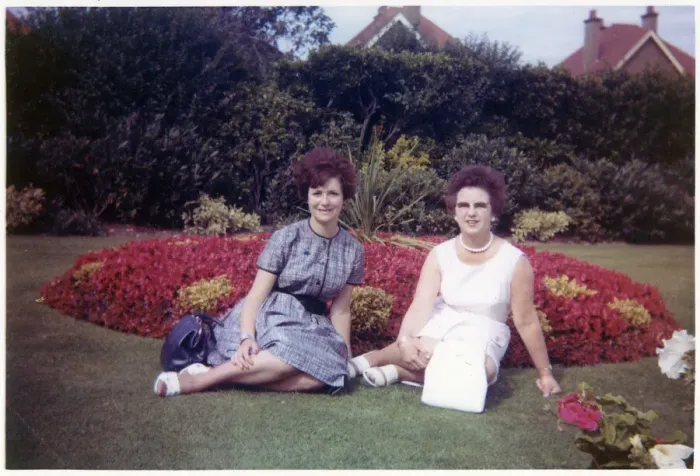 Framed Print : Young woman and her Mother sitting in a formal garden Framed Print : Young woman and her Mother sitting in a formal garden