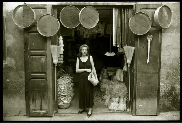 Framed Print : Young woman outside hardware shop, Valencia, Spain Framed Print : Young woman outside hardware shop, Valencia, Spain