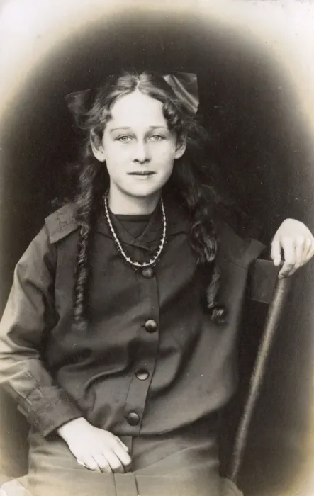 Framed Print : Young woman with ringlets and bow, USA Framed Print : Young woman with ringlets and bow, USA