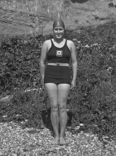 Young woman in swimsuit at the seaside