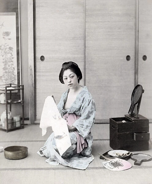 Young woman washing and dressing, Japan, c. 1880 s