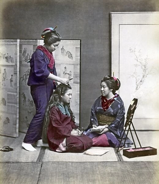 Young women doing their hair, Japan, circa 1880s