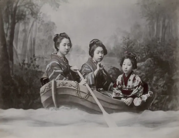 Framed Print : Young women in a rowing boat, studio scene tableau Framed Print : Young women in a rowing boat, studio scene tableau