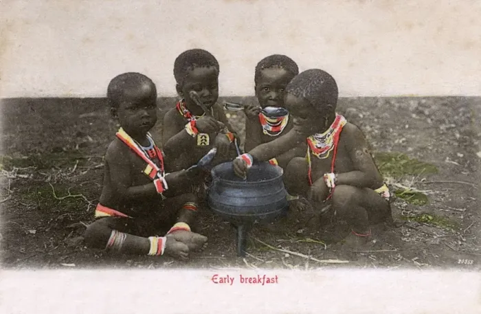 Framed Print : Four young Zulu children enjoy an early breakfast Framed Print : Four young Zulu children enjoy an early breakfast