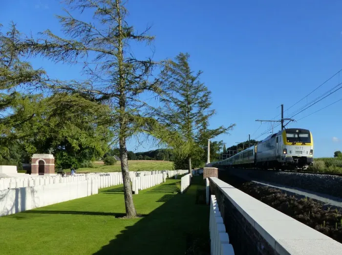 Framed Print : Ypres train passing Larch Wood CWGC Cemetery Framed Print : Ypres train passing Larch Wood CWGC Cemetery