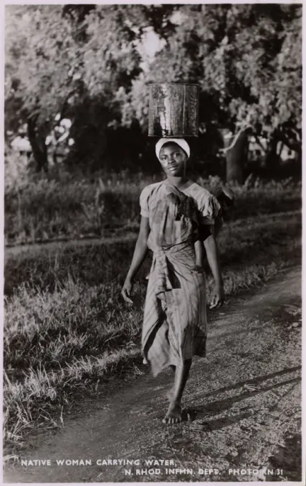 Framed Print : Zambia (Northern Rhodesia) - Woman carrying water Framed Print : Zambia (Northern Rhodesia) - Woman carrying water