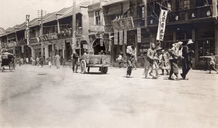 Framed Print : Zhenjiang, China - Labourer pull cart of rocks - street