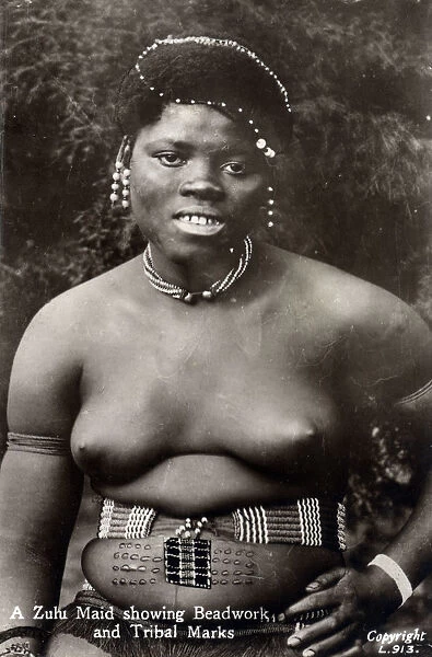 Zulu Maid showing traditional beadwork and scarification
