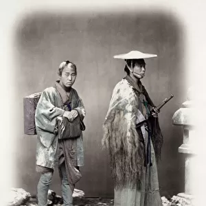1860s Japan - portrait of a samurai and his servant travelling in snow Felice or Felix