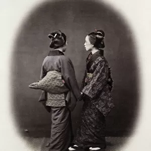 1860s Japan - portrait of two young women in ornate kimonos