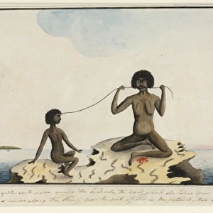 Aboriginal woman healing a child