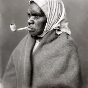 Aboriginal woman smoking a pipe, Australia, c. 1890