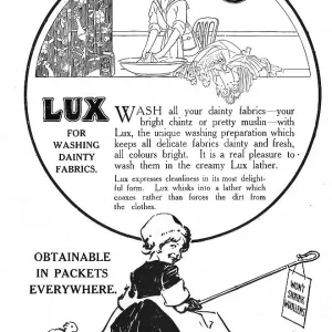Advert for Lux soap flakes, an illustration of a woman handwashing with Lux, and a girl smiling at the viewer. Date: 1918 Advert for Lux soap flakes, an illustration of a woman handwashing with Lux, and a girl smiling at the viewer. Date: 1918