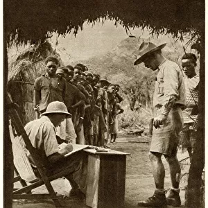African labourers lined up to receive their wages