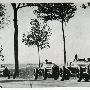 Alfa-Romeos, opening lap of Grand Prix de la Marne, France