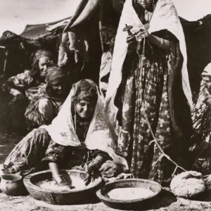 Algeria - Nomadic Women performing cooking and textile tasks