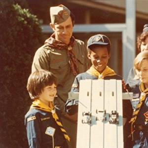 American Scouts playing with cars