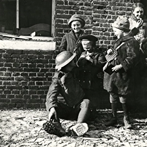 American soldier with children, Brancourt, France, WW1