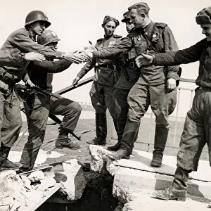 American soldiers shake hands w. Russians River Elbe, 1945 W