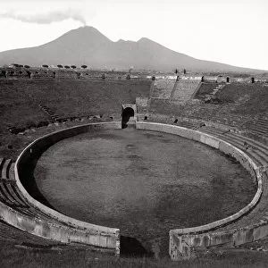 Amphitheatre at Pompeii with Mount Vesuvius in background