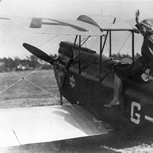 Amy Johnson with her de Havilland DH60G Gipsy Moth G-aAH