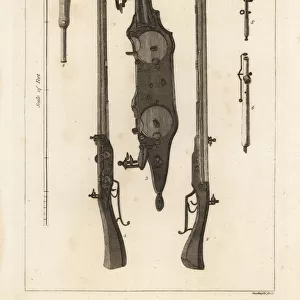 Ancient double-charge carbine with two flintlocks