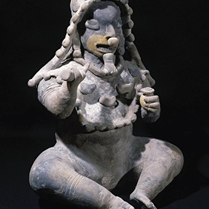 The Ancient Jama-Coaque Culture. Ecuador. Male figure sittin