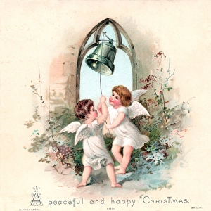 Two angels ringing a bell on a Christmas card